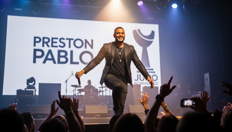 Preston Pablo performing onstage with a microphone under blue and magenta concert lighting